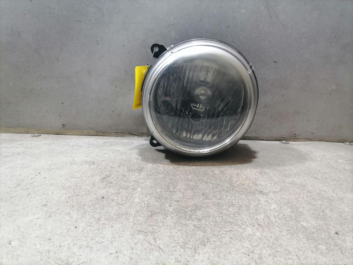 Jeep Cherokee KJ original Scheinwerfer vorn links Halogen mit LWR oberhalb vergilbt Bj.2001